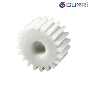 Plastic spur gear POM polyoxymethylene close-up white precision teeth